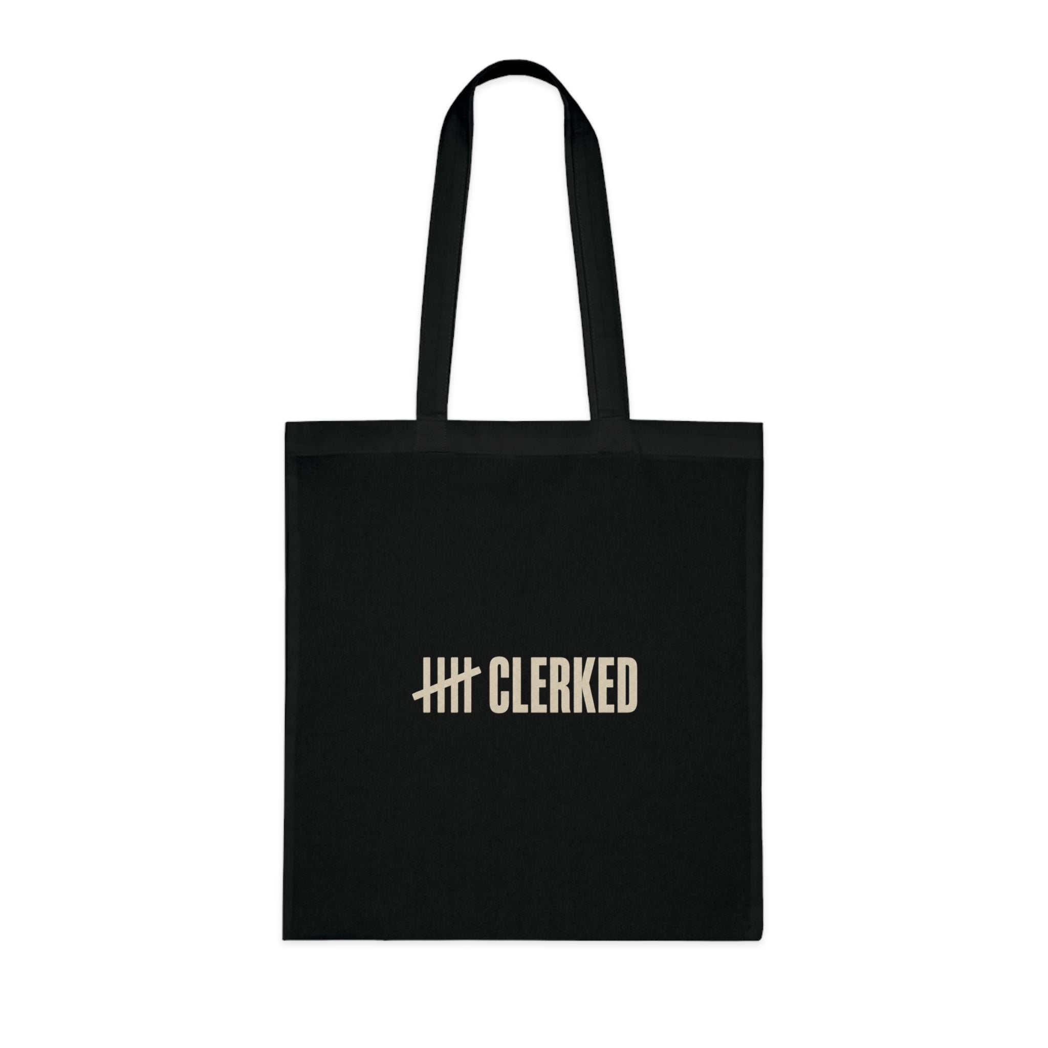 Minimalist cotton tote bag carried over the shoulder while shopping
