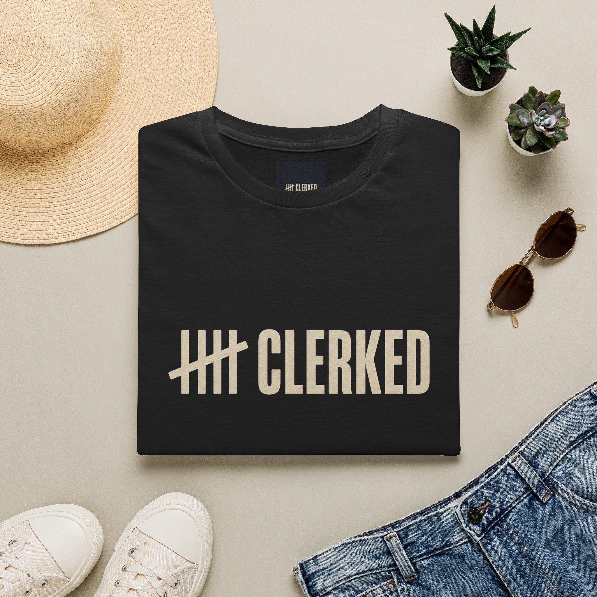 Minimalist Clerked logo print on the front of the flagship graphic tee