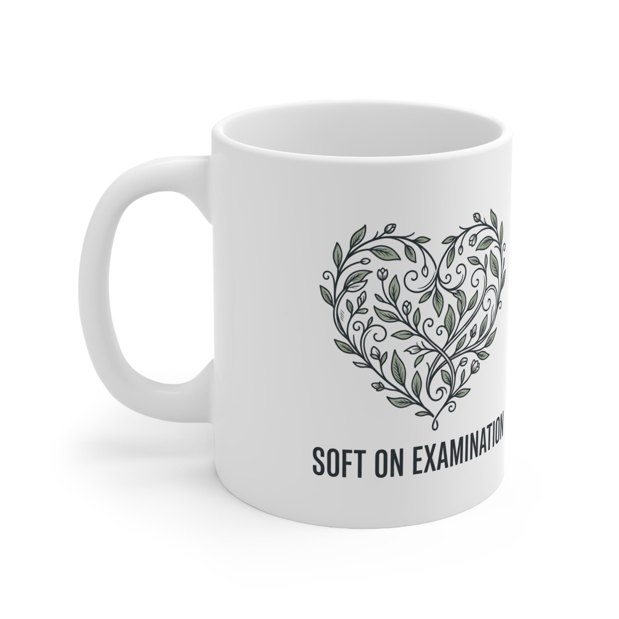 Close-up of the bold print design on the 'Soft on Examination' coffee mug